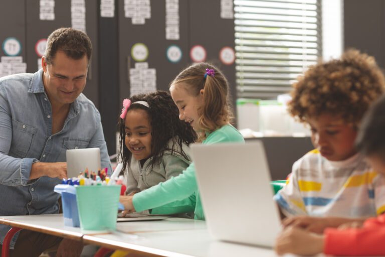 Elementary Students Doing Project with Teacher