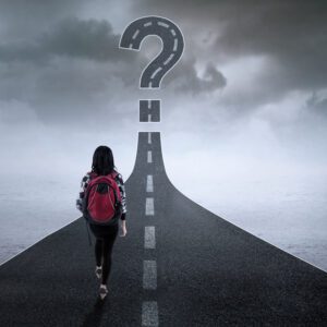 Student Walking on Road Toward Question Mark