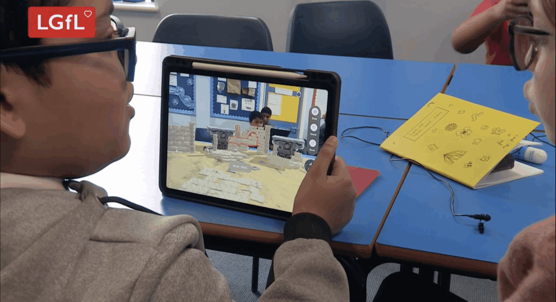 Elementary Students Using Sandbox AR on a Tablet